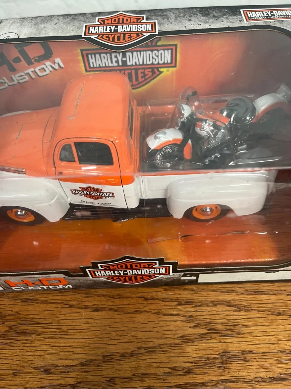 Authentic collectible Harley Davidson 1948 Ford model truck hauling a Panhead